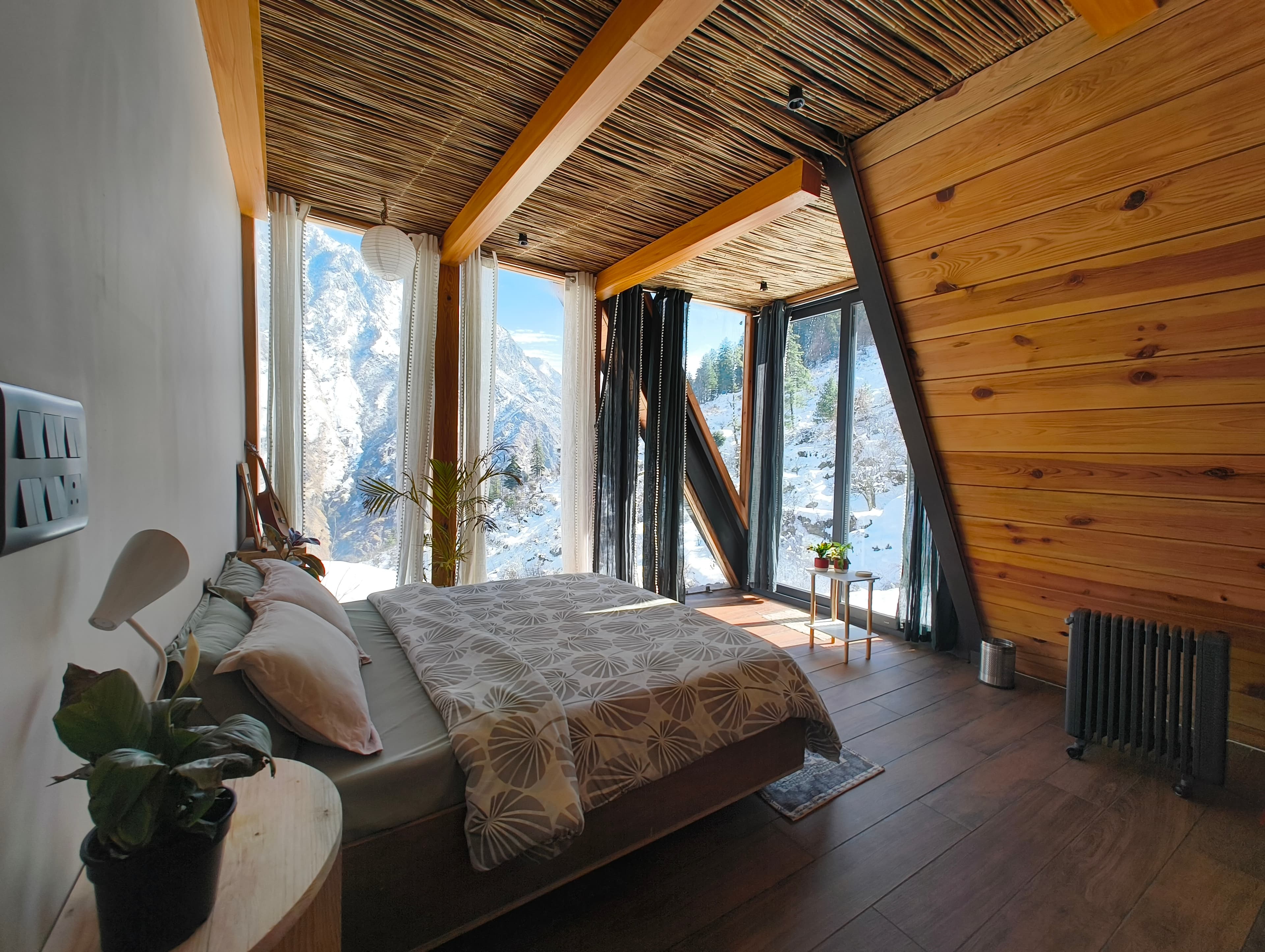 Forest View room — warm wood A-frame with mountain views